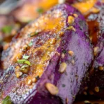 Vibrant roasted purple sweet potatoes .